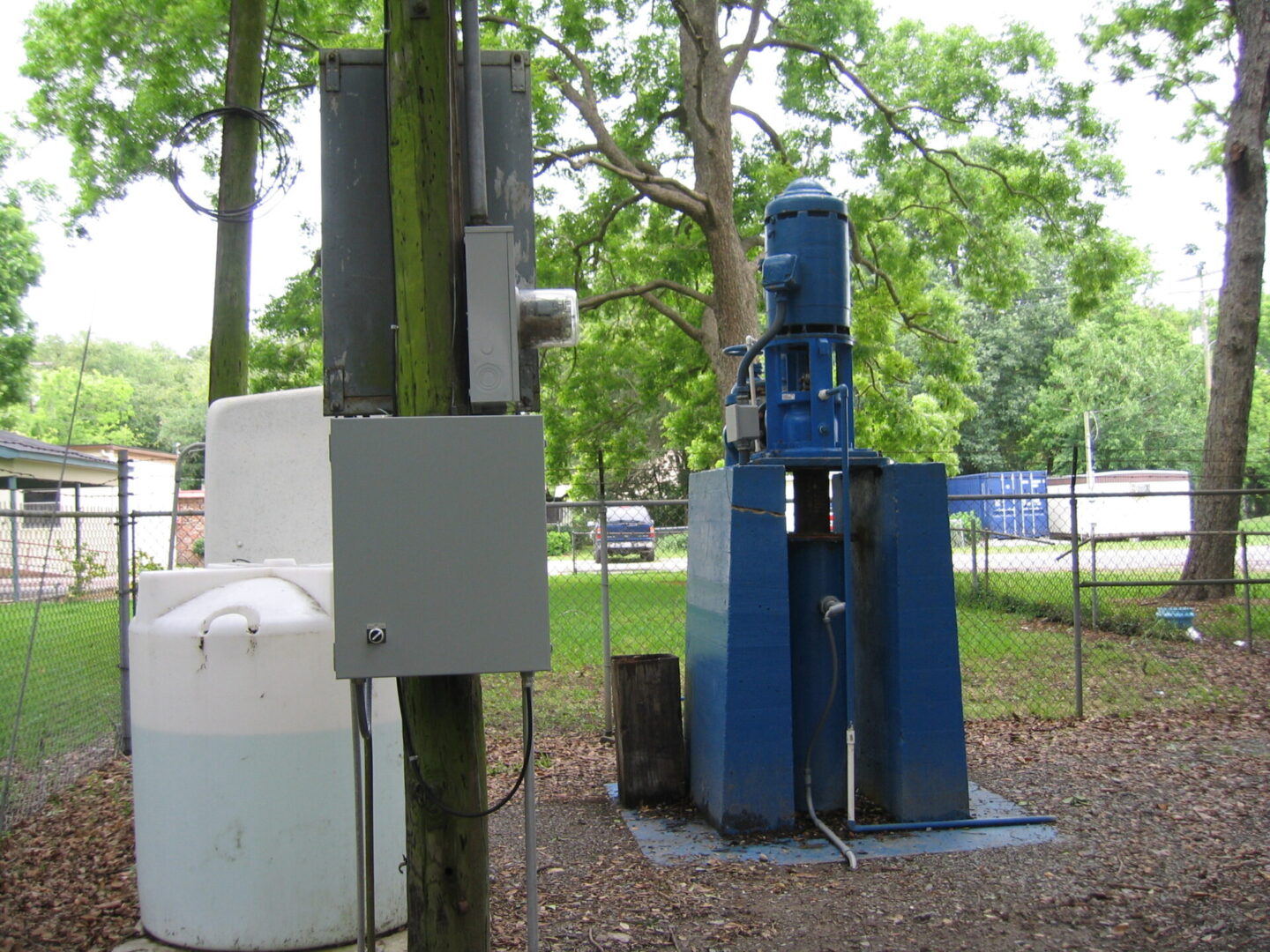 Blue vertical industrial pump and control box