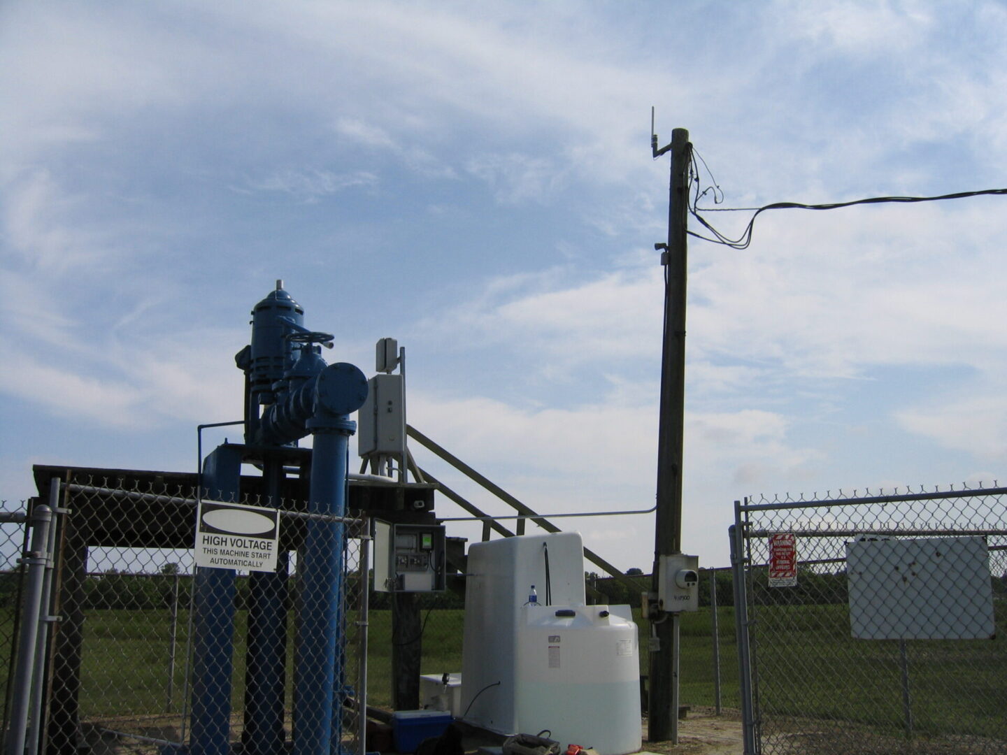 Fenced water treatment pump station and tanks
